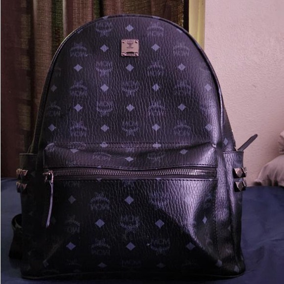 MCM Black Leather Backpack with Monogram Print
